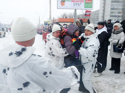 activist_arrested_holding_rainbow_flag_olypmic_torch_relay